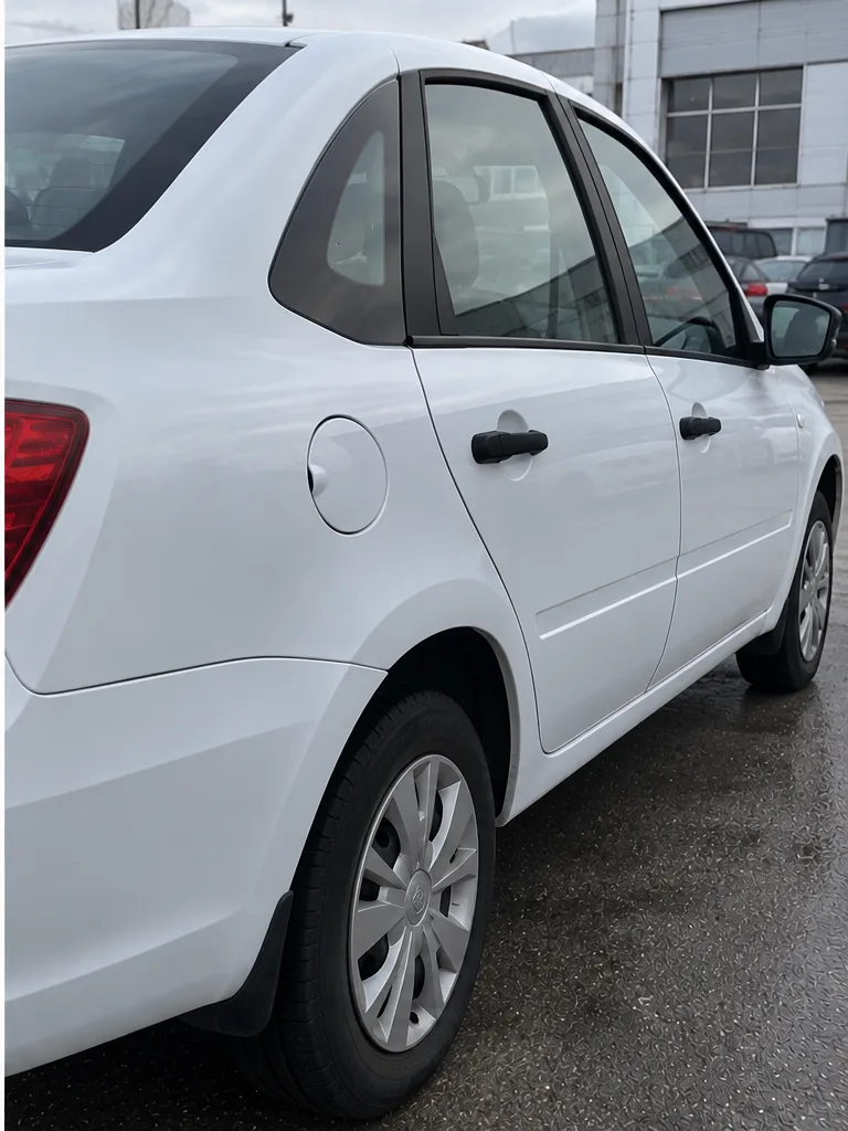 Lada Granta — заднее крыло — после ремонта